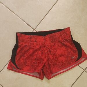 Nike Women’s Red Athletic Shorts with Black Side Panels
